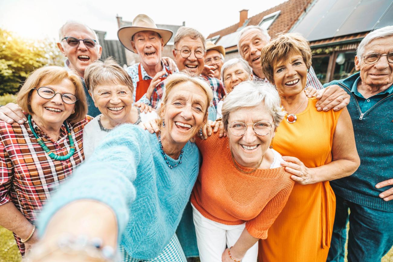 a group of seniors smiling at the camera